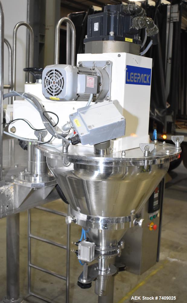 Used Leepack Servo Drive Powder Auger Feeder, Model AW-590IV. Mitsubishi model MR-JZS-200A servo drive. Foot pedal switch. Level sensor. Mounted on stainless steel frame with casters. 3/60/480 Volt.